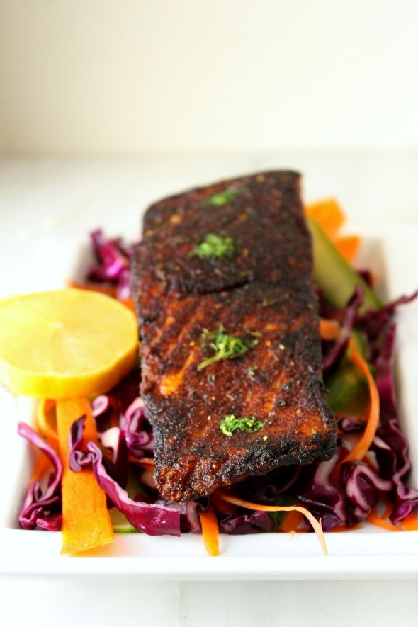 blackened salmon with parsley powder and purple cabbage slaw