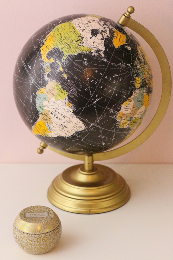 gold candle + globe