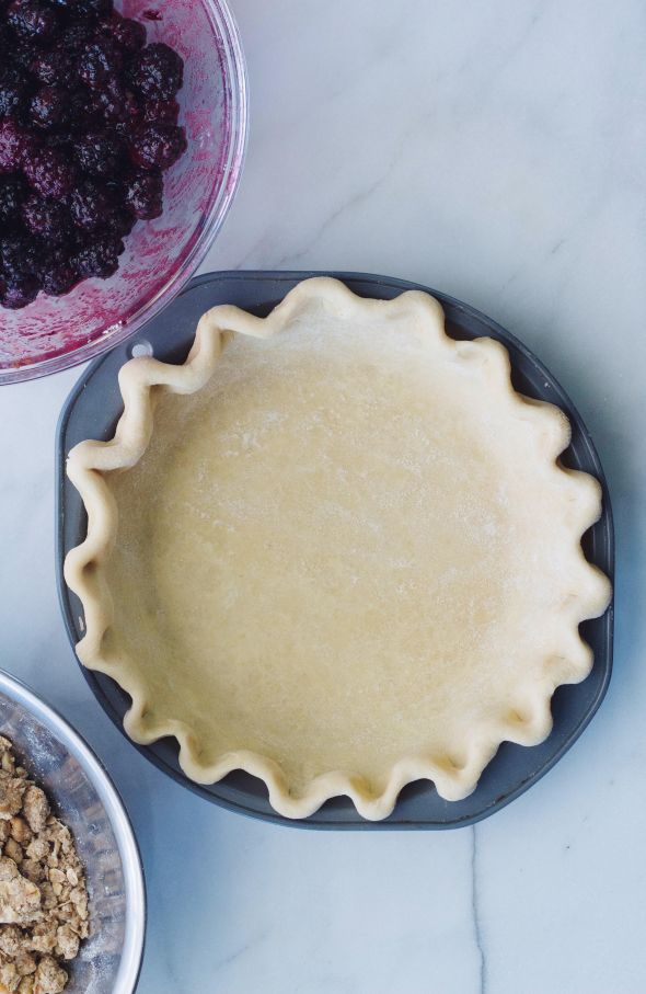 pie crust, berries, and a crumble